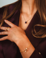 Valentina Ketting - Goudkleurige Ketting met donker paarse Steen.